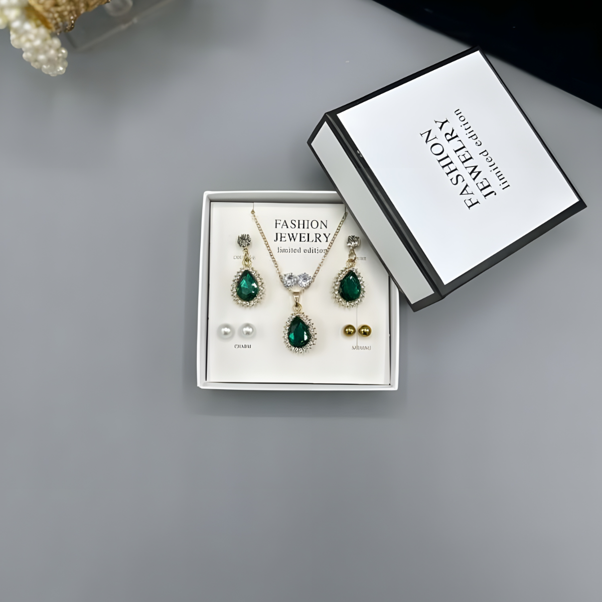 The ‘Royal Emerald’ Teardrop Suite — Deep Forest Crystal & Halo Stud Collection