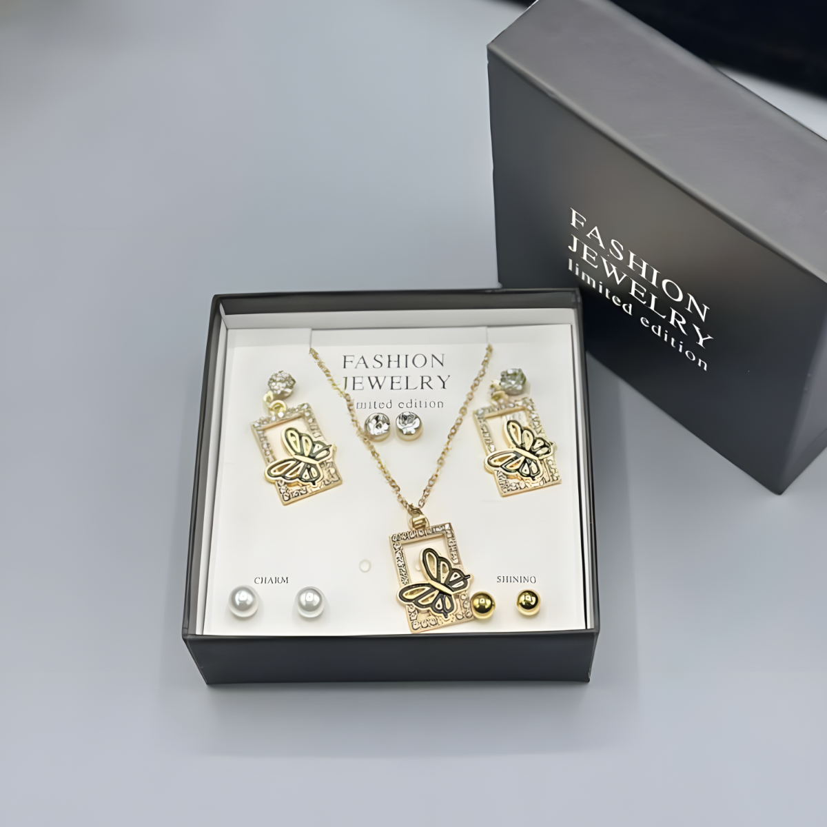The ‘Monarch’ Limited Edition Butterfly Jewelry Suite — Necklace & Multi-Stud Collection